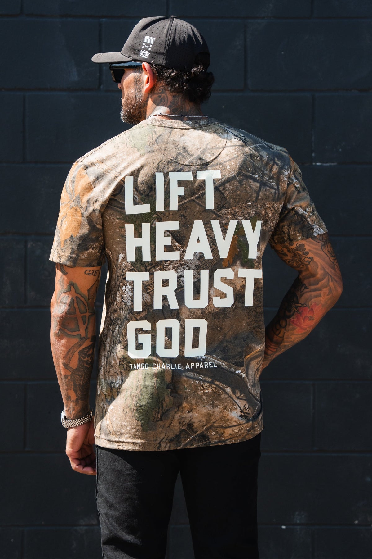 Lift Heavy. Trust God. - Realtree Premium Camo Tee