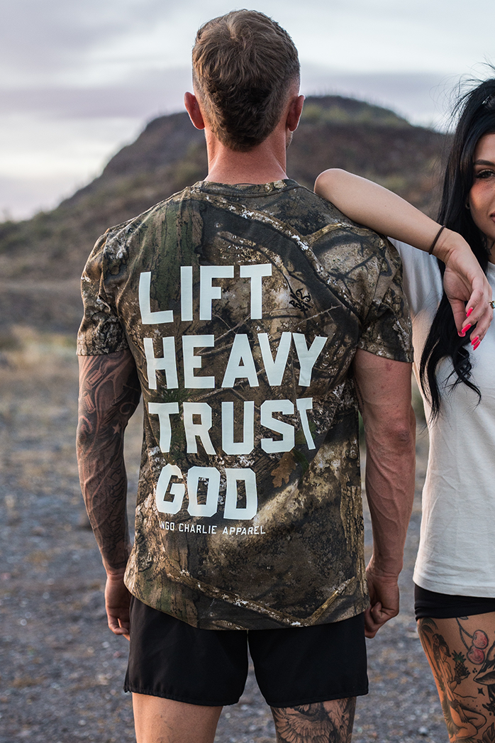 Lift Heavy. Trust God. - Realtree Premium Camo Tee